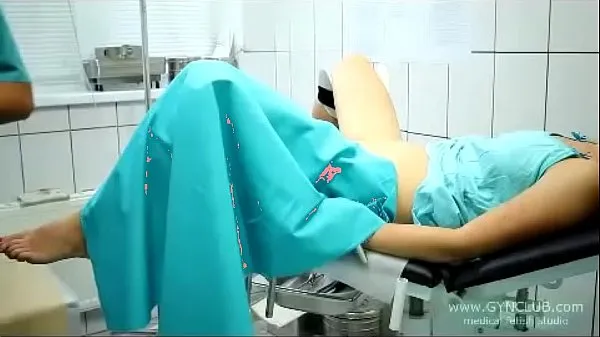 Hot beautiful girl on a gynecological chair (33 fine Clips